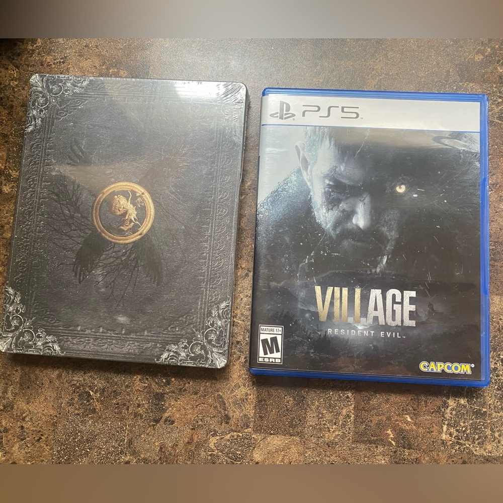 PS5 Resident Evil Village (opened) with Steelbook that is still sealed